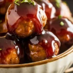 Party meatballs with grape jelly and barbecue sauce glaze